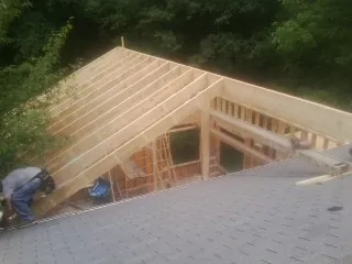 Framing a new roof addition that ties into an existing shingle roof in Califon